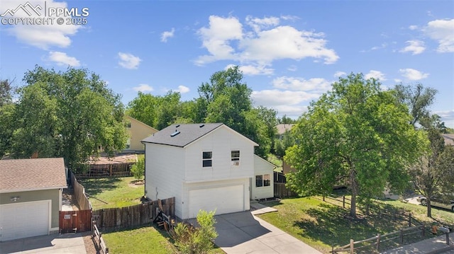 604 Blossom Field Rd, Fountain, CO 80817 - view of side of property with concrete driveway