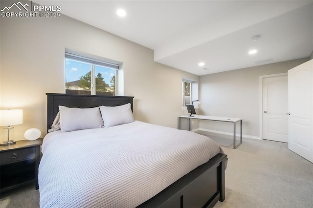 bedroom featuring light carpet, recessed lighting, and baseboards