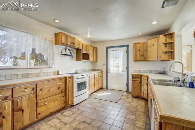 1475 S Peyton Hwy, Calhan, CO 80808 - kitchen featuring electric range, a sink, open shelves, tile counters, and recessed lighting