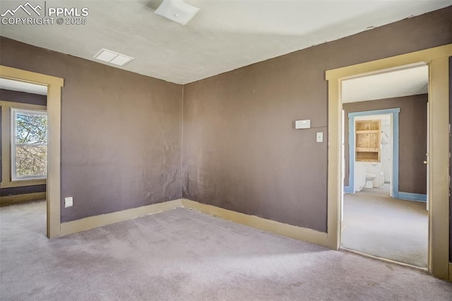 1475 S Peyton Hwy, Calhan, CO 80808 - carpeted empty room with baseboards