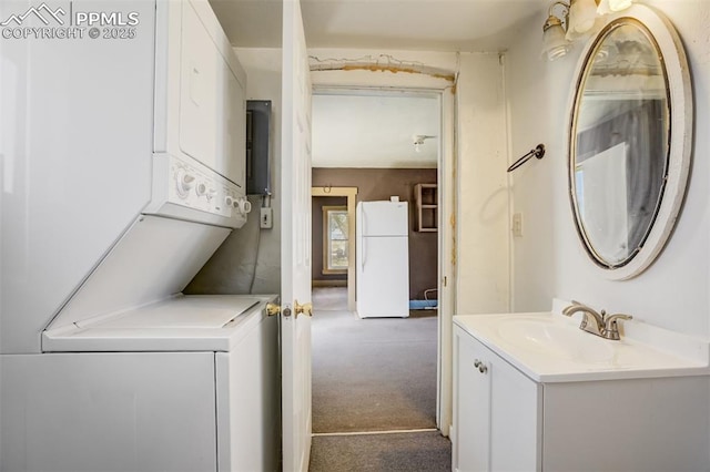 1475 S Peyton Hwy, Calhan, CO 80808 - laundry room with stacked washer / drying machine and carpet floors
