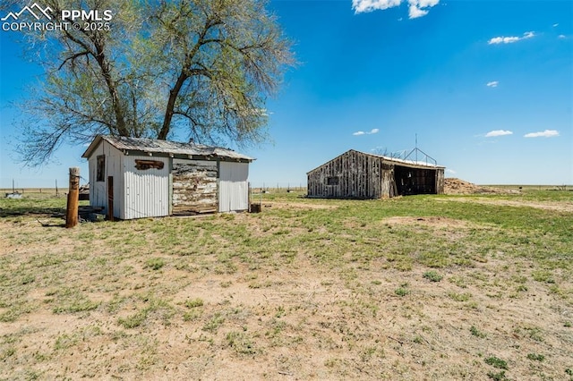 1475 S Peyton Hwy, Calhan, CO 80808 - view of yard with an outdoor structure and a pole building