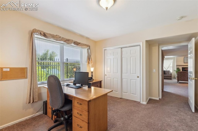 2744 La Strada Grande Hts, Colorado Springs, CO 80906 - carpeted office space with healthy amount of natural light and baseboards