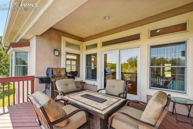 2744 La Strada Grande Hts, Colorado Springs, CO 80906 - deck featuring area for grilling and outdoor dining space