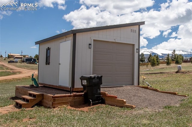 view of outdoor structure featuring an outbuilding and a mountain view