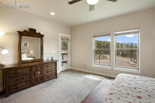 carpeted bedroom featuring baseboards, ceiling fan, and recessed lighting