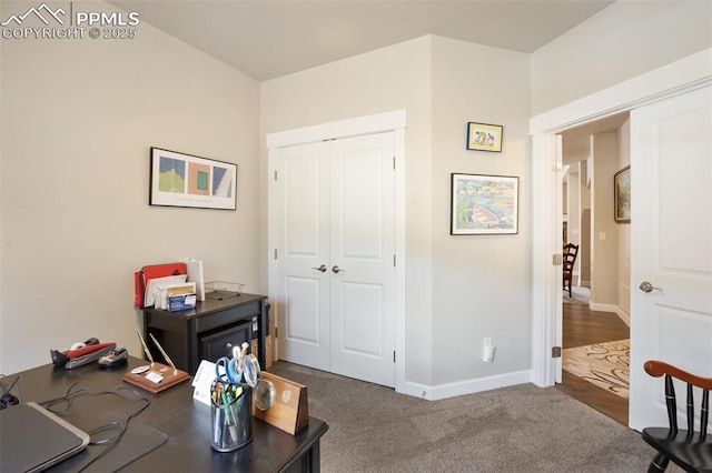 home office with baseboards and carpet flooring