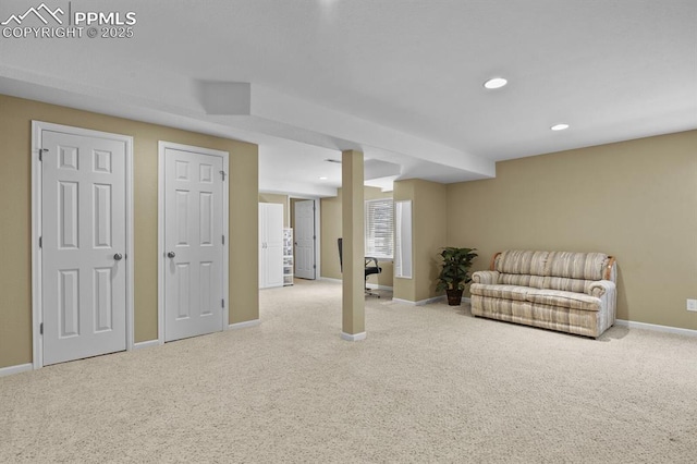 below grade area with carpet, baseboards, and recessed lighting