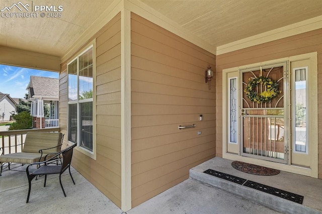entrance to property with covered porch