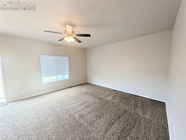 unfurnished room with carpet floors, baseboards, and ceiling fan