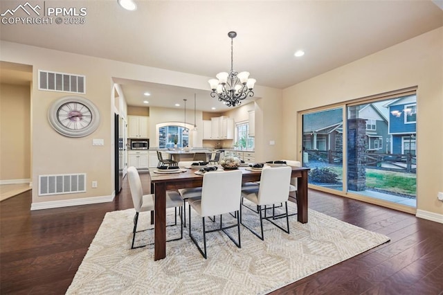 8451 Meadow Wing Cir, Colorado Springs, CO 80927 - dining area featuring baseboards, a chandelier, recessed lighting, and dark wood-style floors