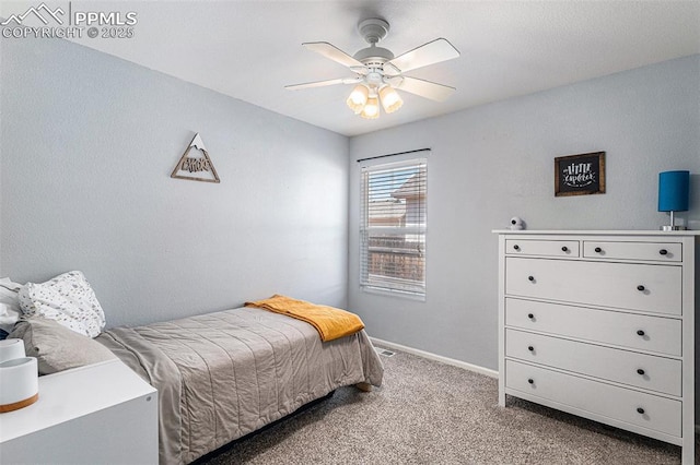 12543 Pine Valley Cir, Peyton, CO 80831 - carpeted bedroom featuring baseboards and a ceiling fan