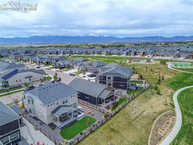 aerial perspective of suburban area featuring a mountain backdrop