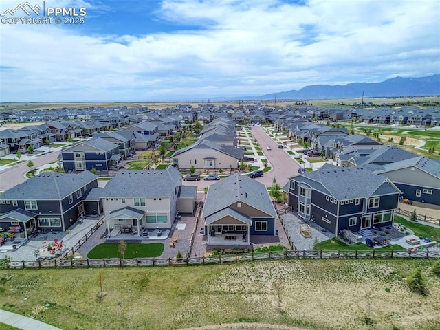 aerial perspective of suburban area with mountains