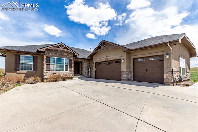 20097 Royal Troon Dr, Monument, CO 80132 - view of front of home featuring an attached garage, driveway, stone siding, and stucco siding