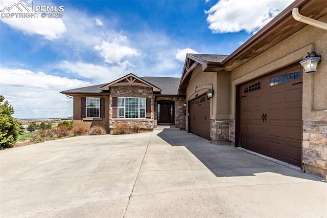 20097 Royal Troon Dr, Monument, CO 80132 - ranch-style home featuring driveway, stone siding, and a garage