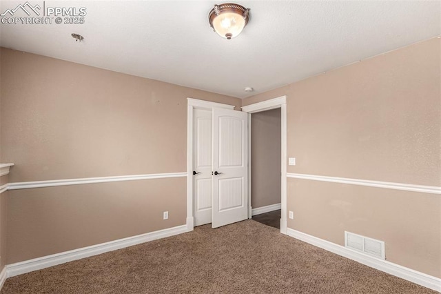 20097 Royal Troon Dr, Monument, CO 80132 - unfurnished bedroom featuring carpet floors and baseboards