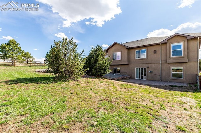 20097 Royal Troon Dr, Monument, CO 80132 - view of green lawn featuring a patio area