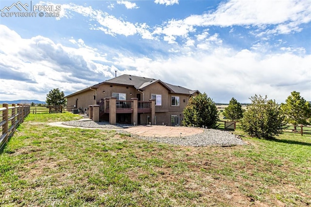 20097 Royal Troon Dr, Monument, CO 80132 - rear view of property featuring a wooden deck and stucco siding
