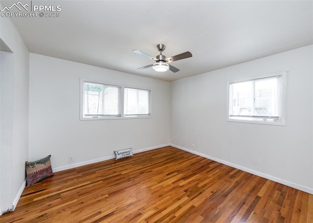 1036 Florence Ave, Colorado Springs, CO 80905 - spare room with wood finished floors, baseboards, and a ceiling fan