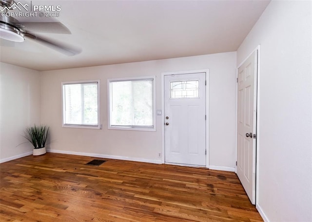 1036 Florence Ave, Colorado Springs, CO 80905 - foyer entrance featuring wood finished floors, ceiling fan, and baseboards