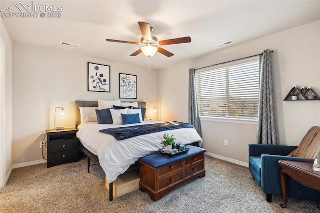 carpeted bedroom with baseboards and a ceiling fan