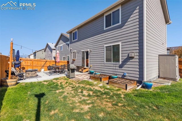 rear view of property featuring a patio