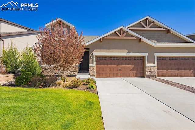4479 Hessite Loop, Colorado Springs, CO 80938 - view of front facade featuring stucco siding, stone siding, a front yard, an attached garage, and concrete driveway