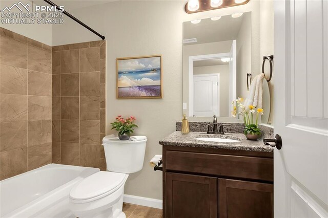 4479 Hessite Loop, Colorado Springs, CO 80938 - full bath featuring toilet, vanity, shower / bathtub combination, and baseboards