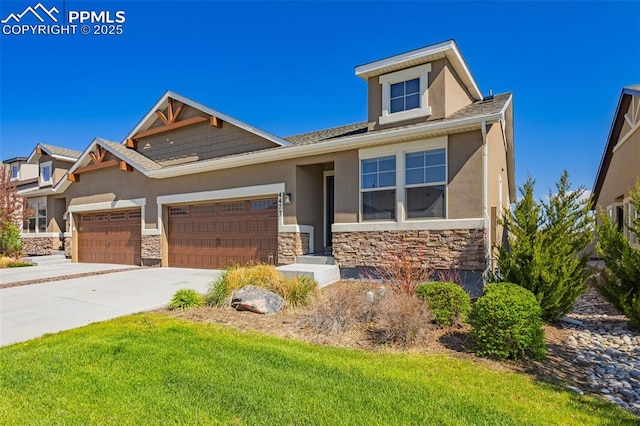 4473 Hessite Loop, Colorado Springs, CO 80938 - view of front facade featuring stone siding, an attached garage, stucco siding, and concrete driveway