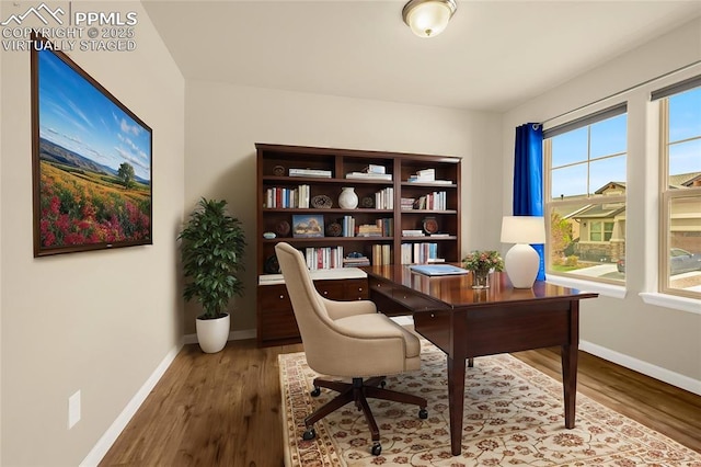 4473 Hessite Loop, Colorado Springs, CO 80938 - home office with baseboards and wood finished floors