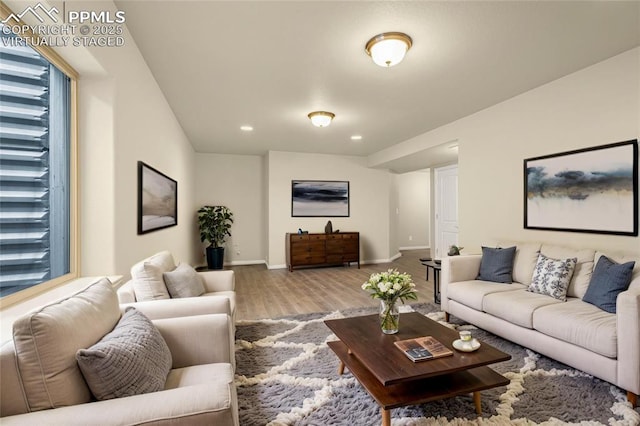 4473 Hessite Loop, Colorado Springs, CO 80938 - living room with wood finished floors, baseboards, recessed lighting, and plenty of natural light