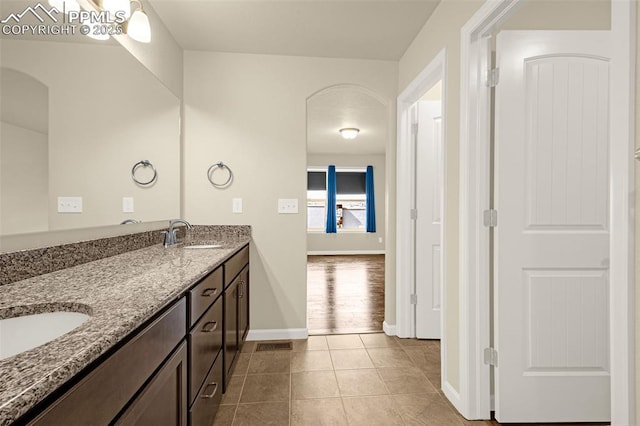 4473 Hessite Loop, Colorado Springs, CO 80938 - full bathroom featuring baseboards, double vanity, and tile patterned flooring