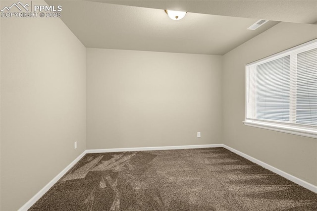 4473 Hessite Loop, Colorado Springs, CO 80938 - empty room featuring dark colored carpet and baseboards