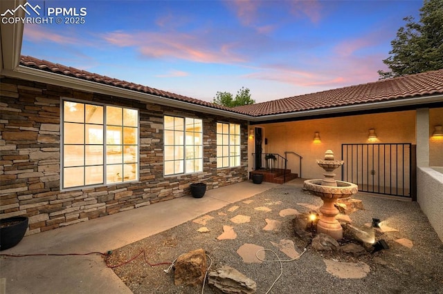 1308 Mesa Ave, Colorado Springs, CO 80906 - patio terrace at dusk featuring a patio area