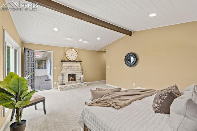 1308 Mesa Ave, Colorado Springs, CO 80906 - carpeted bedroom with access to exterior, recessed lighting, baseboards, and a fireplace
