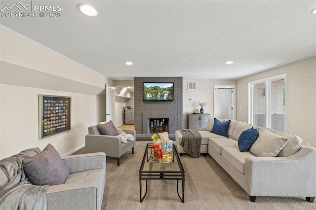 1308 Mesa Ave, Colorado Springs, CO 80906 - living room with light carpet, a fireplace, recessed lighting, baseboards, and a textured ceiling