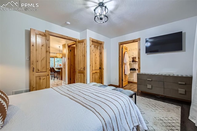 1978 High Chateau Rd, Florissant, CO 80816 - bedroom featuring wood finished floors, a closet, and baseboards