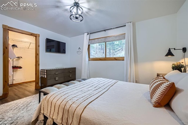 1978 High Chateau Rd, Florissant, CO 80816 - bedroom featuring wood finished floors and baseboards