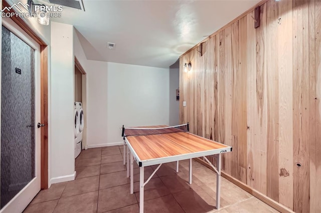 1978 High Chateau Rd, Florissant, CO 80816 - dining space with separate washer and dryer, light tile patterned floors, and baseboards