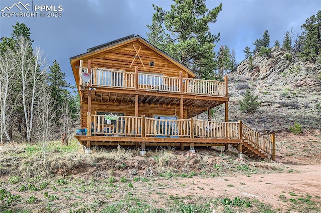 1978 High Chateau Rd, Florissant, CO 80816 - log-style house featuring a wooden deck