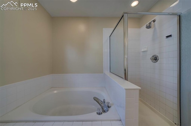6726 Annanhill Pl, Colorado Springs, CO 80922 - bathroom featuring a stall shower, a bath, and recessed lighting
