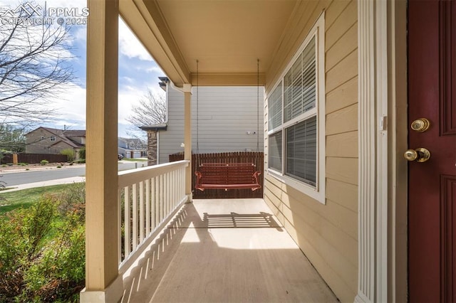 6726 Annanhill Pl, Colorado Springs, CO 80922 - balcony with covered porch