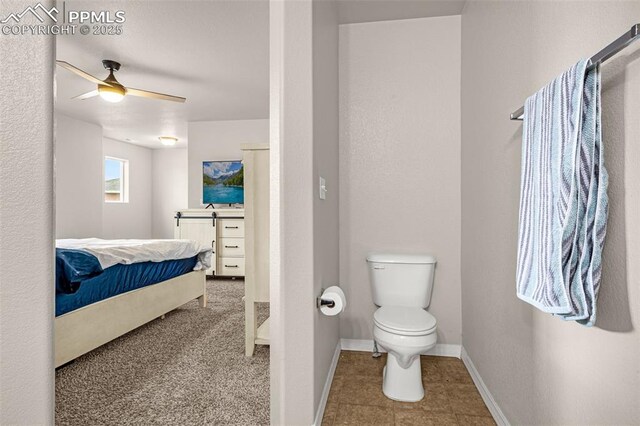 11081 Buckhead Pl, Fountain, CO 80817 - bathroom featuring ceiling fan, toilet, baseboards, and tile patterned flooring