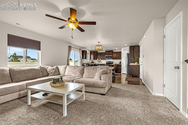 11081 Buckhead Pl, Fountain, CO 80817 - living area featuring ceiling fan, recessed lighting, baseboards, and dark carpet
