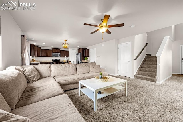 11081 Buckhead Pl, Fountain, CO 80817 - living room with baseboards, recessed lighting, stairs, a ceiling fan, and light carpet