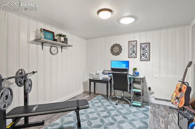 home office with wood finished floors