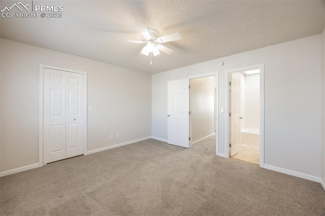 5805 Dutchess Dr, Colorado Springs, CO 80923 - unfurnished bedroom featuring carpet, baseboards, a textured ceiling, ensuite bath, and ceiling fan
