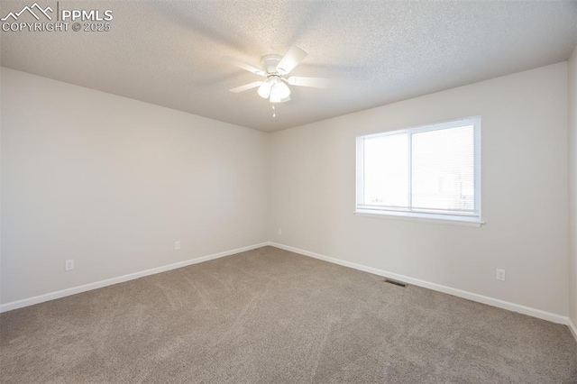 5805 Dutchess Dr, Colorado Springs, CO 80923 - unfurnished room with ceiling fan, carpet flooring, baseboards, and a textured ceiling