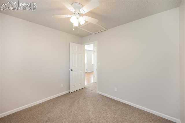 5805 Dutchess Dr, Colorado Springs, CO 80923 - empty room with light colored carpet, a ceiling fan, and baseboards